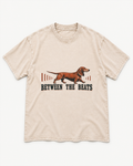 Apricot washed T-shirt with Dachshund Between The Beats Audio Wave front artwork