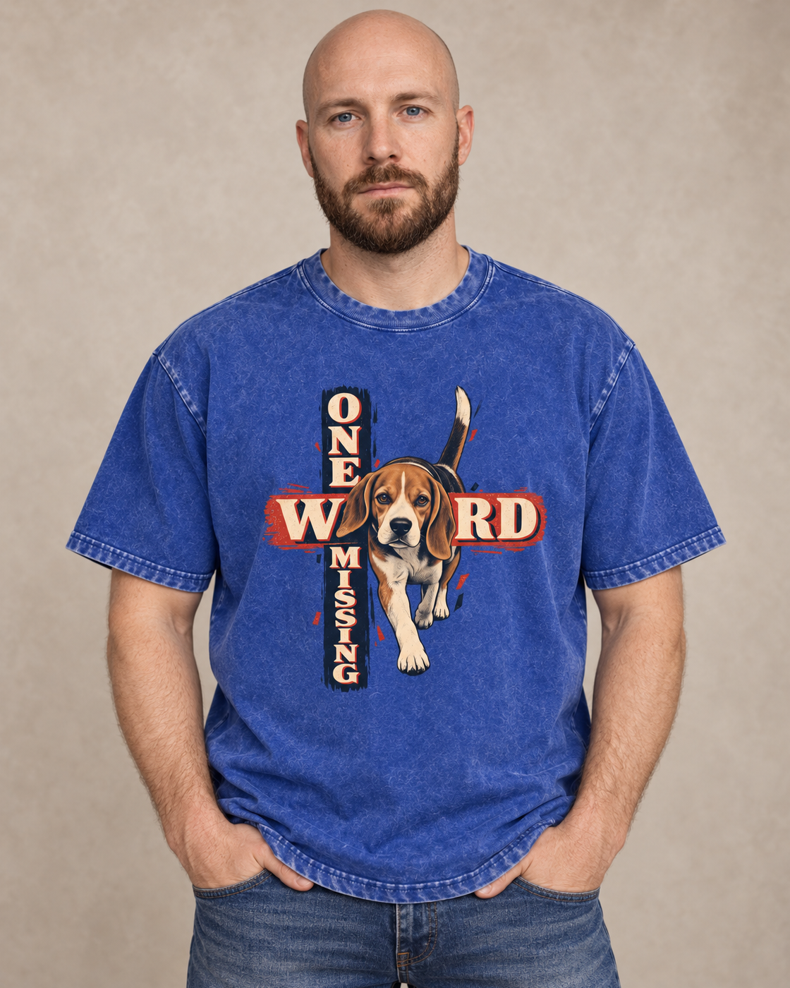 Adult model wears Royal Blue Beagle One Word Missing washed T-shirt in a warm studio portrait