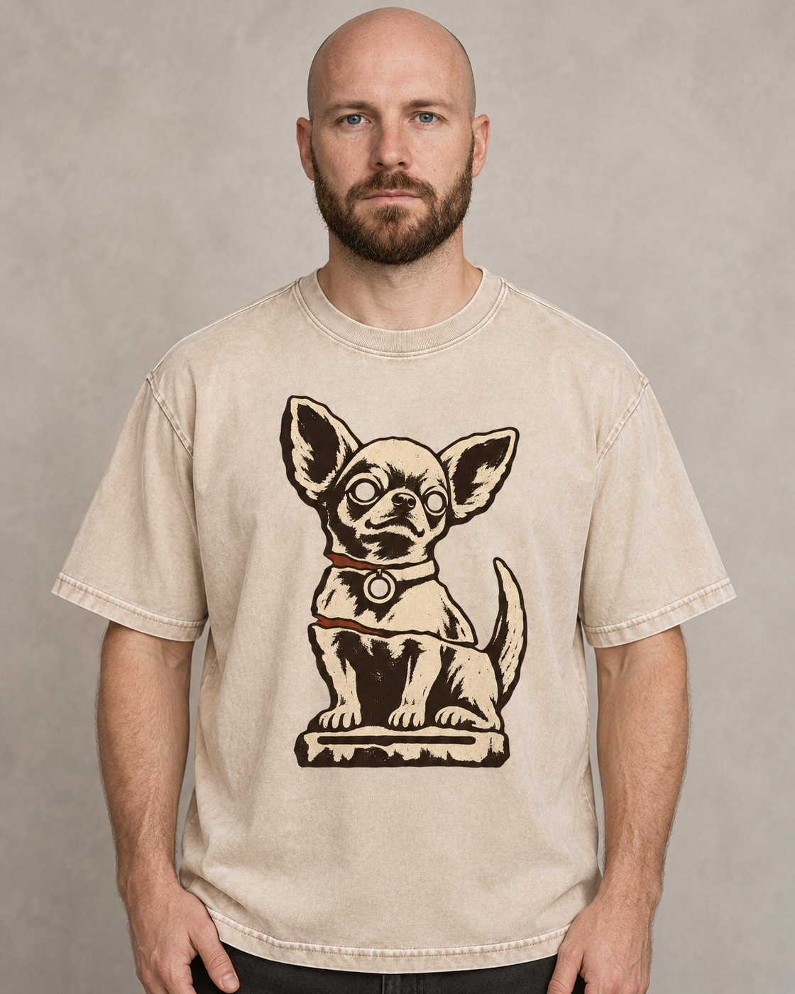 Adult model wears Apricot Chihuahua Woodcut Relic Statue washed T-shirt in a warm studio portrait