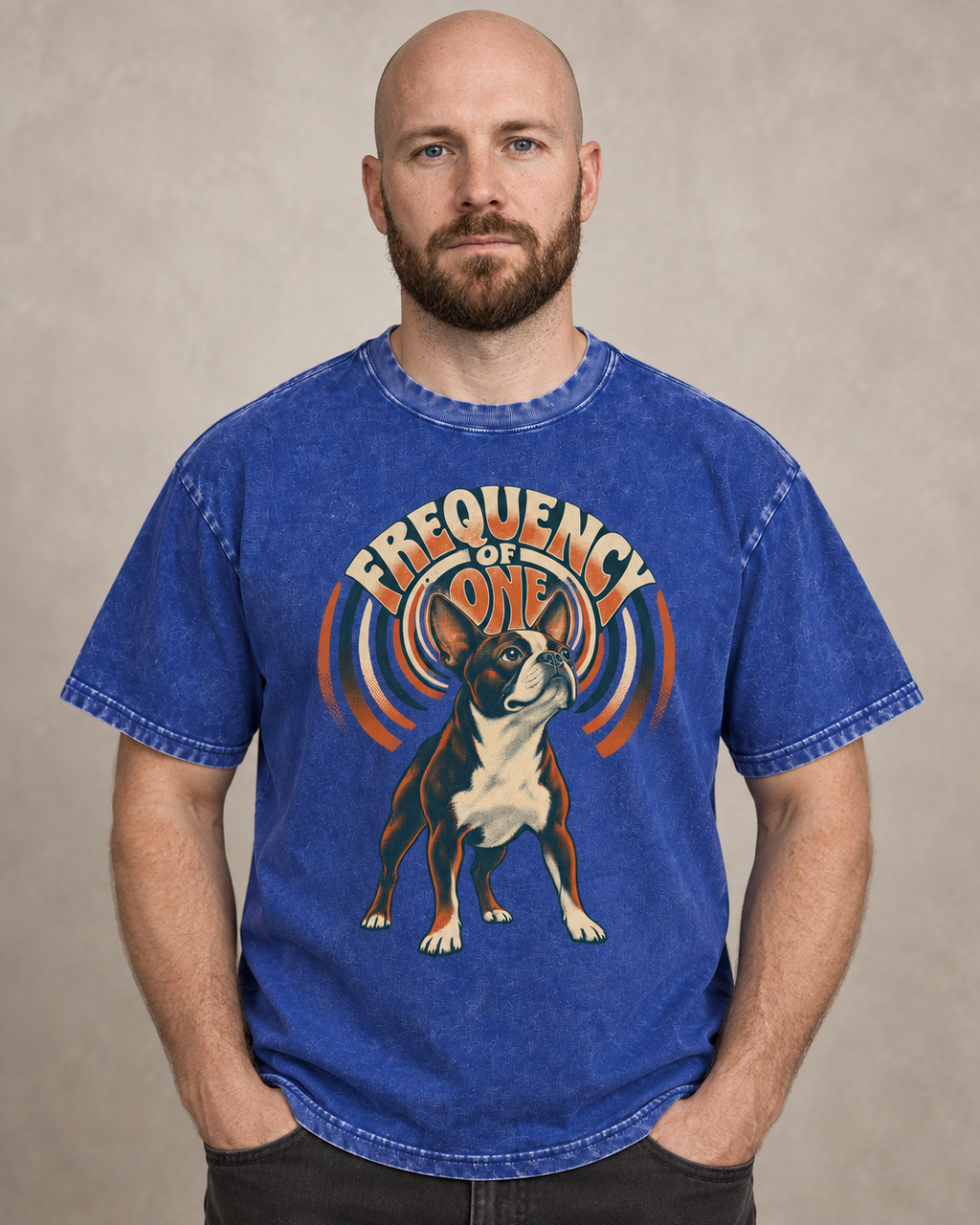 Adult model wears Royal Blue Boston Terrier Frequency of One washed T-shirt in a warm studio portrait