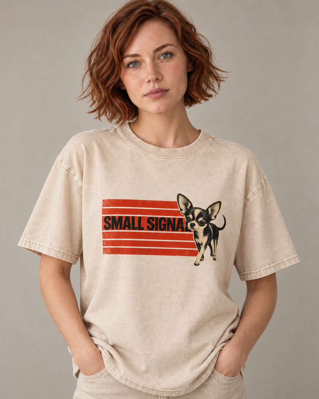Adult model wears Apricot Chihuahua Small Signal washed T-shirt in a warm studio portrait