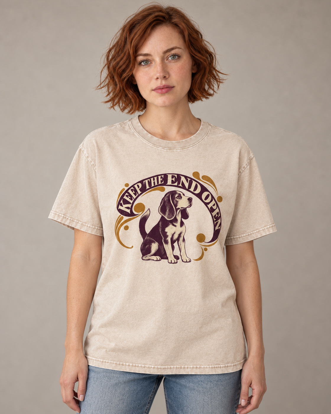 Adult model wears Apricot Beagle Keep The End Open Ornamental washed T-shirt in a warm studio portrait
