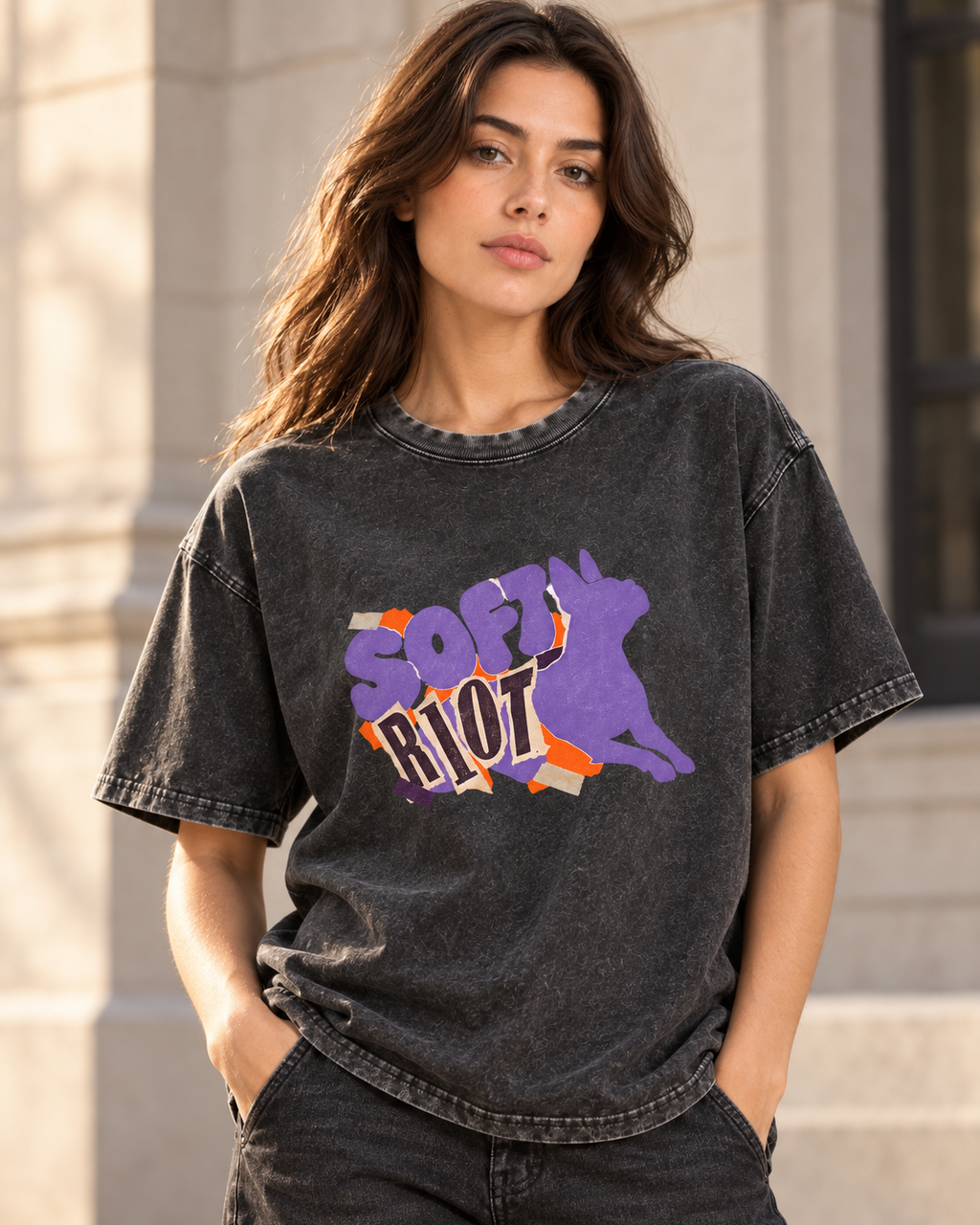 Adult model wears Black Boston Terrier Soft Riot washed T-shirt in a three-quarter street portrait