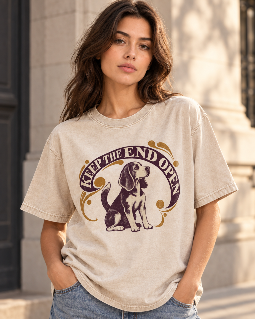 Adult model wears Apricot Beagle Keep The End Open Ornamental washed T-shirt in a three-quarter street portrait