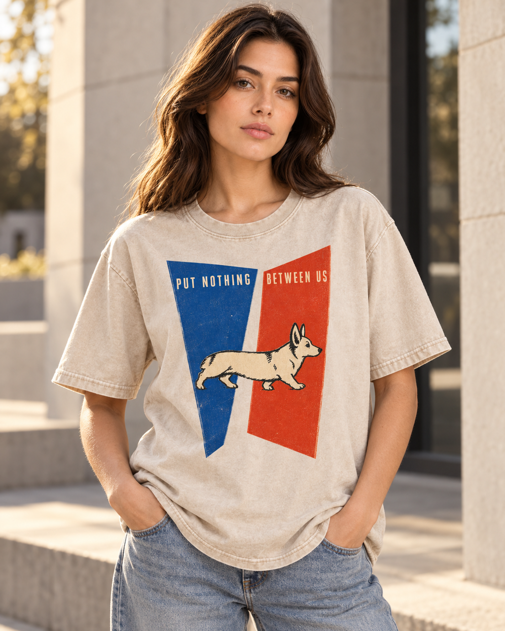 Adult model wears Apricot Corgi Put Nothing Between Us Split Panels washed T-shirt in a three-quarter street portrait