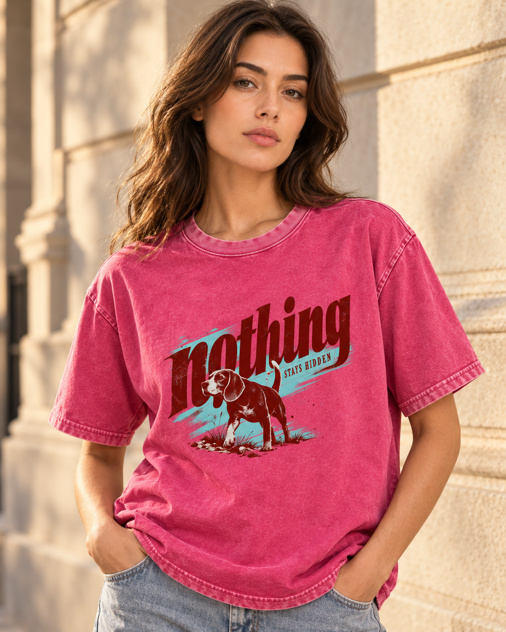 Adult model wears Fuchsia Beagle Nothing Stays Hidden washed T-shirt in a three-quarter street portrait