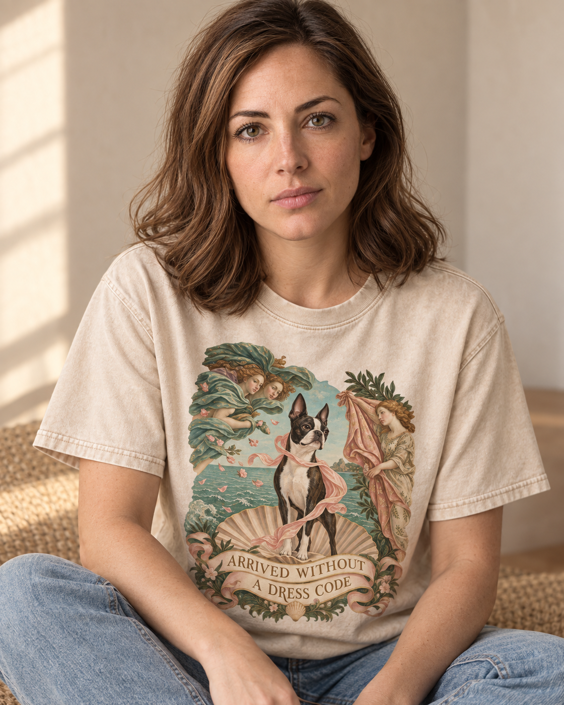 Adult model wears Apricot Boston Terrier Arrived Without a Dress Code Venus Parody washed T-shirt in a seated indoor portrai