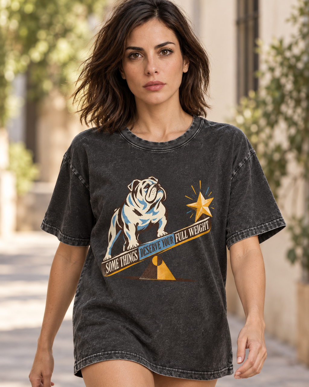 Adult model wears Black English Bulldog Some Things Deserve Your Full Weight washed T-shirt in a natural walking portrait