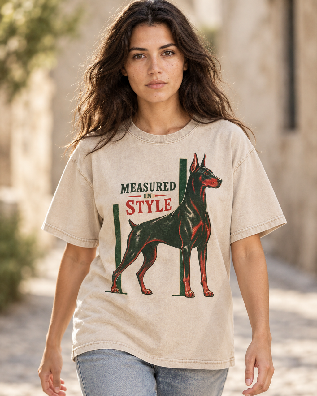 Adult model wears Apricot Doberman Measured in Style Column washed T-shirt in a natural walking portrait