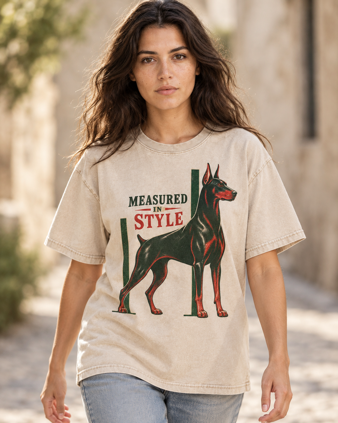 Adult model wears Apricot Doberman Measured in Style Column washed T-shirt in a natural walking portrait