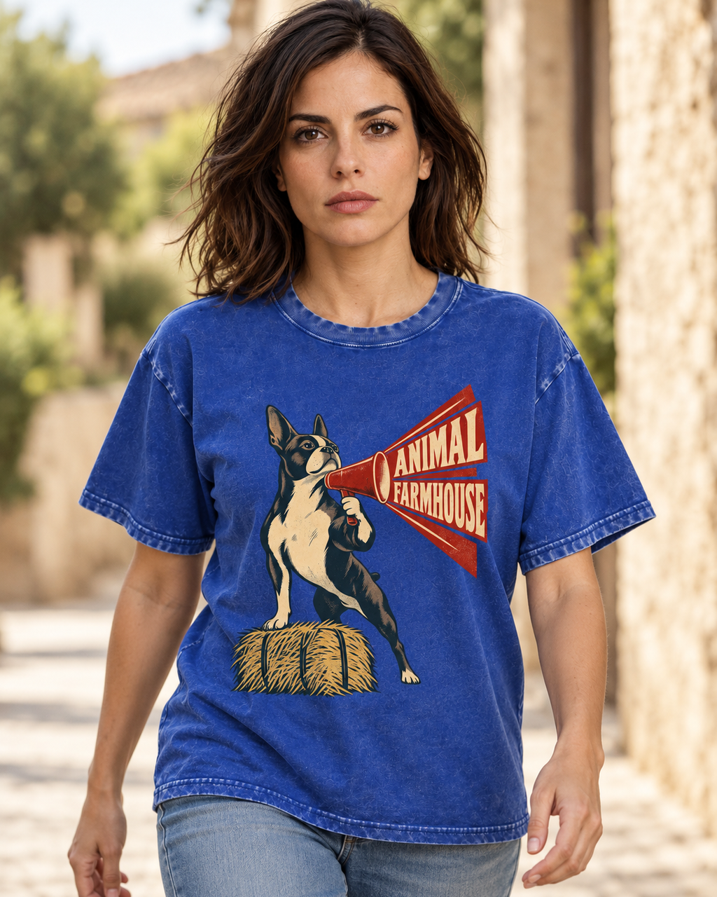 Adult model wears Royal Blue Boston Terrier Animal Farmhouse washed T-shirt in a natural walking portrait