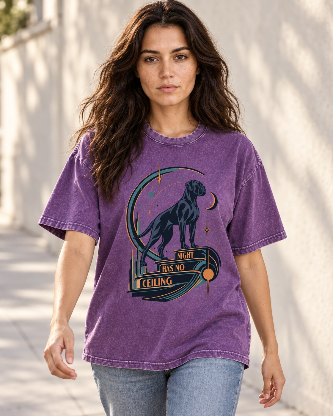 Adult model wears Purple Boxer Night Has No Ceiling Cosmic washed T-shirt in a natural walking portrait