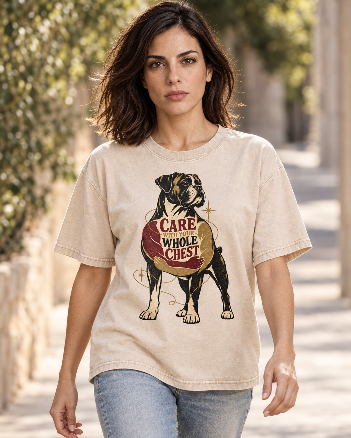 Adult model wears Apricot Boxer Care With Your Whole Chest washed T-shirt in a natural walking portrait