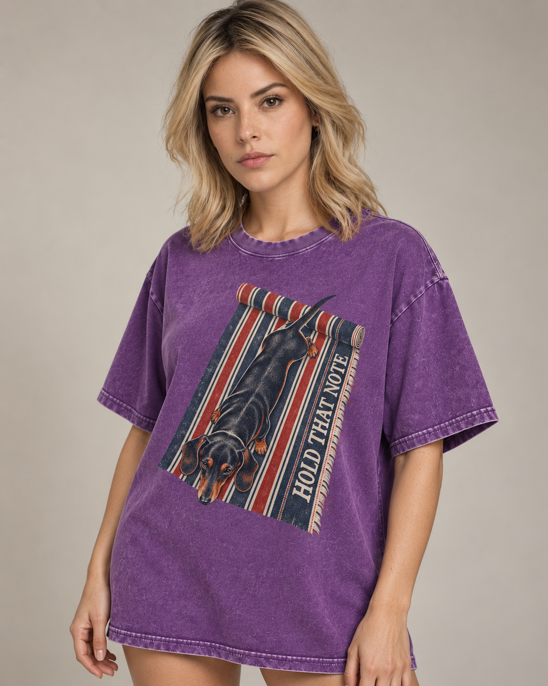 Adult model wears Purple Dachshund Hold That Note Striped Rug washed T-shirt in a side-angle editorial portrait