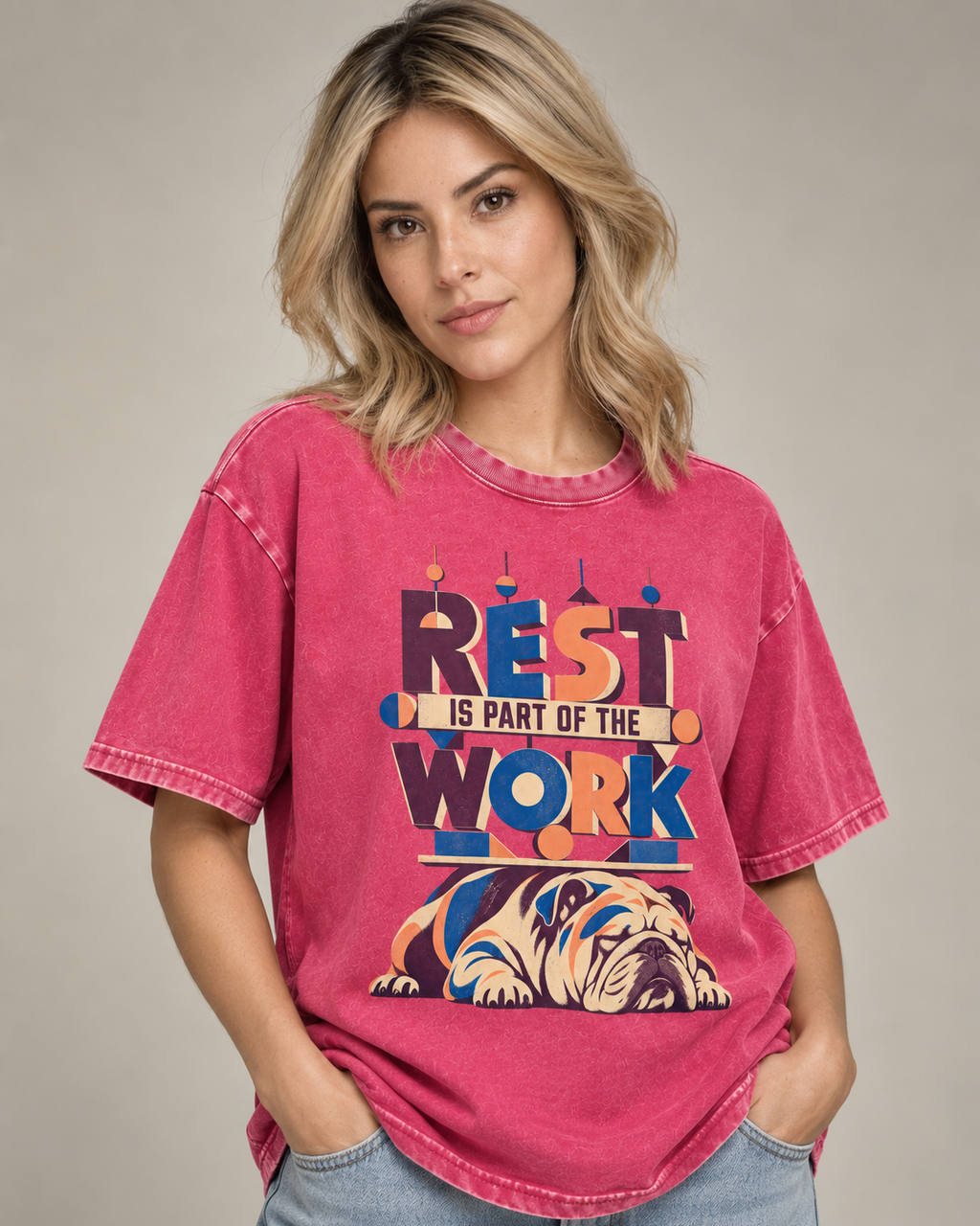 Adult model wears Fuchsia English Bulldog Rest Is Part of the Work Geometric washed T-shirt in a side-angle editorial portra