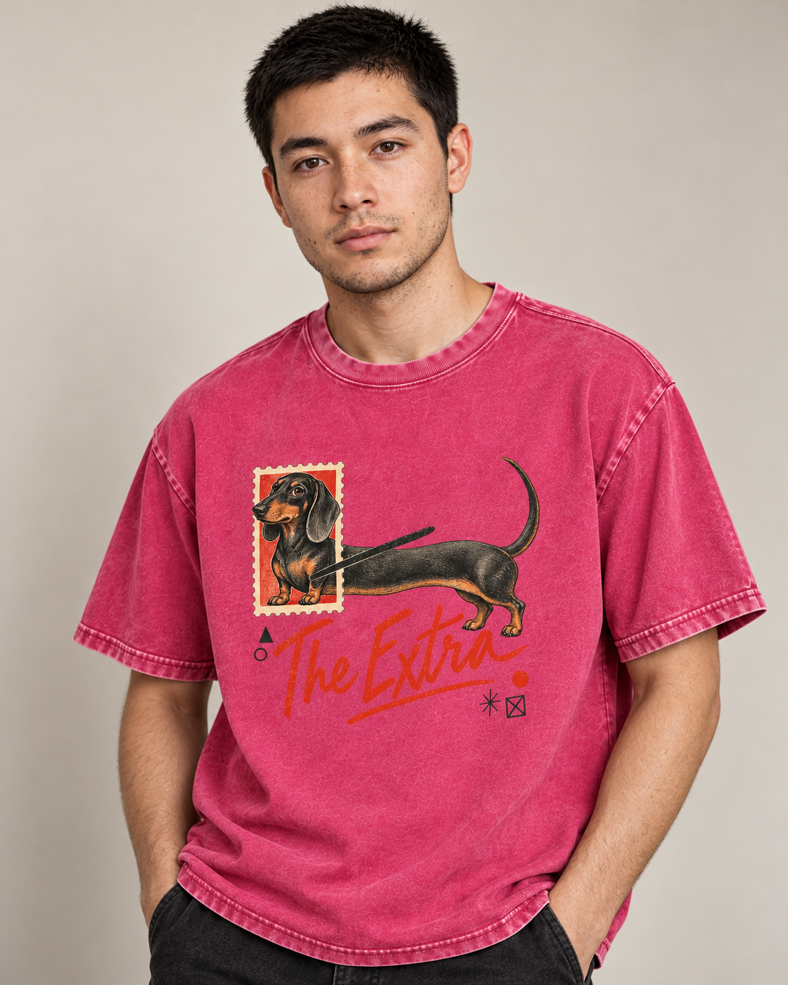 Adult model wears Fuchsia Dachshund The Extra Postage washed T-shirt in a side-angle editorial portrait