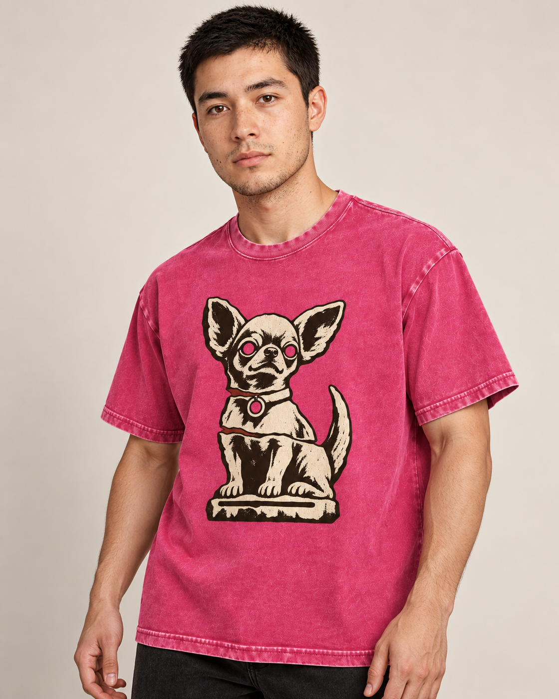 Adult model wears Fuchsia Chihuahua Woodcut Relic Statue washed T-shirt in a side-angle editorial portrait