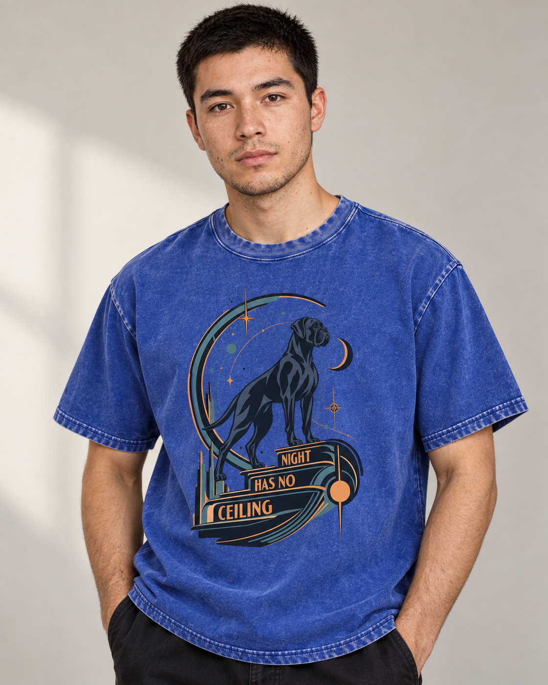 Adult model wears Royal Blue Boxer Night Has No Ceiling Cosmic washed T-shirt in a side-angle editorial portrait