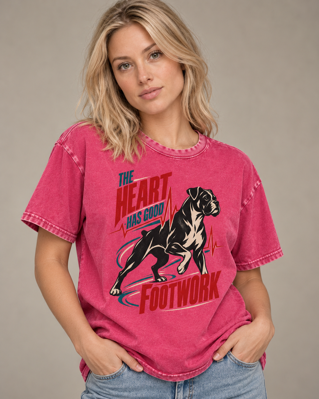Adult model wears Fuchsia Boxer The Heart Has Good Footwork ECG Motion washed T-shirt in a side-angle editorial portrait