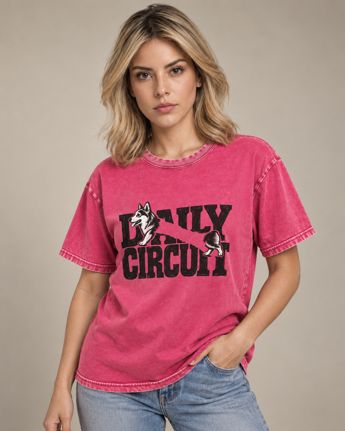 Adult model wears Fuchsia Corgi Family Circuit Running Letterpress washed T-shirt in a side-angle editorial portrait