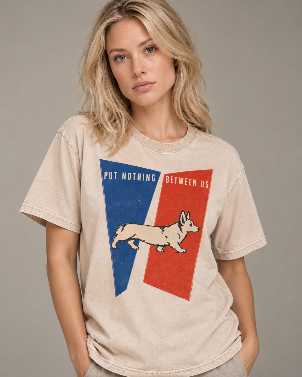 Adult model wears Apricot Corgi Put Nothing Between Us Split Panels washed T-shirt in a side-angle editorial portrait