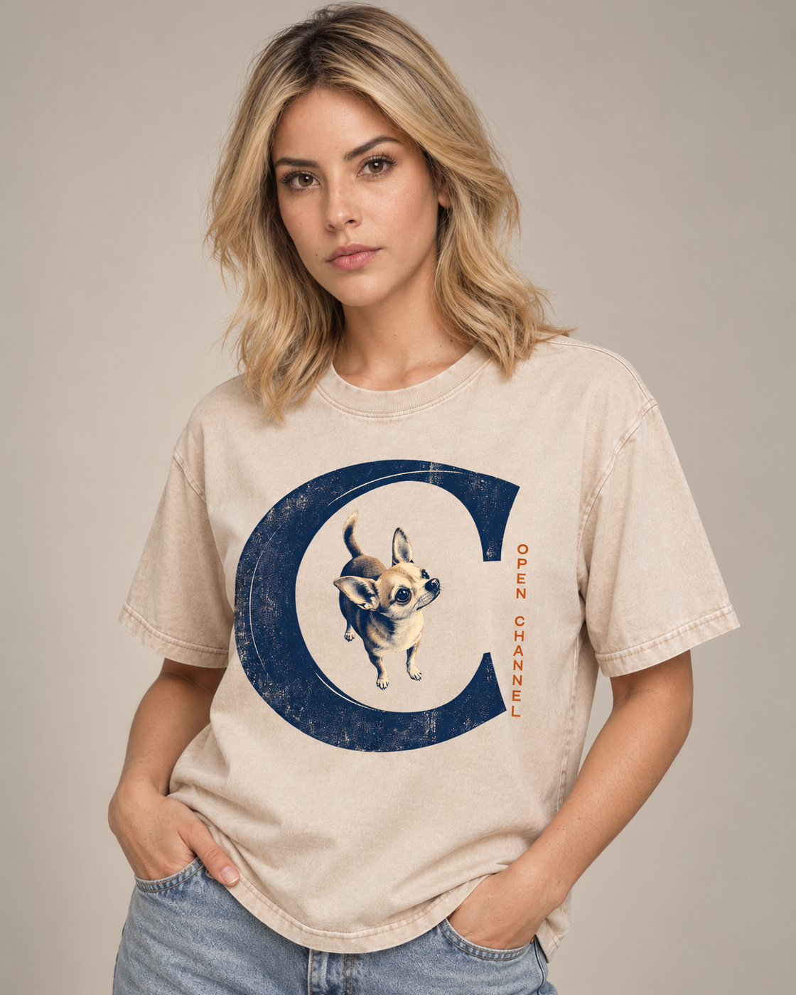 Adult model wears Apricot Chihuahua Open Channel washed T-shirt in a side-angle editorial portrait
