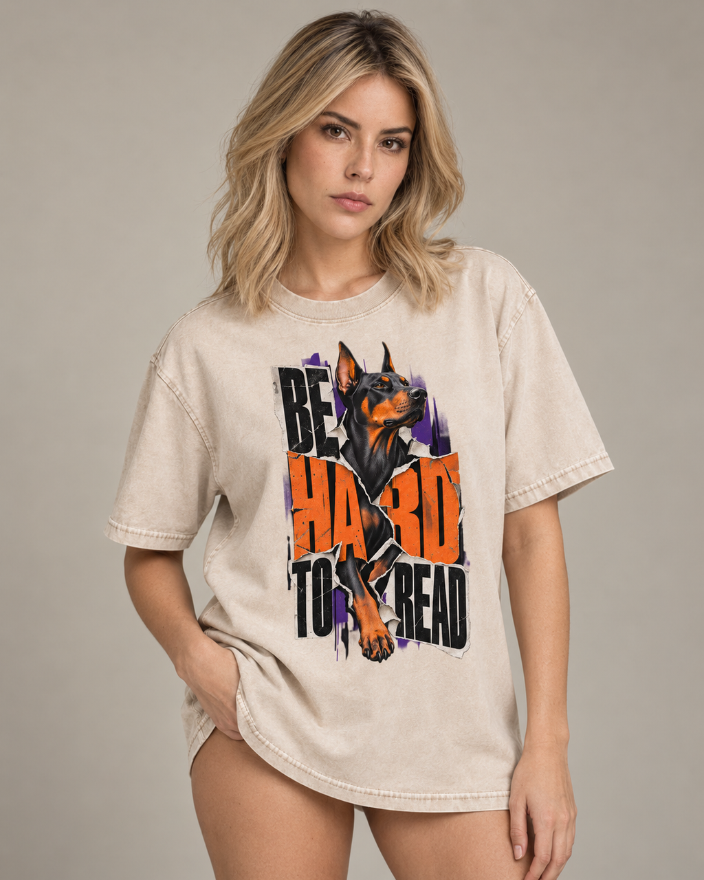 Adult model wears Apricot Doberman Be Hard to Read Torn Poster washed T-shirt in a side-angle editorial portrait