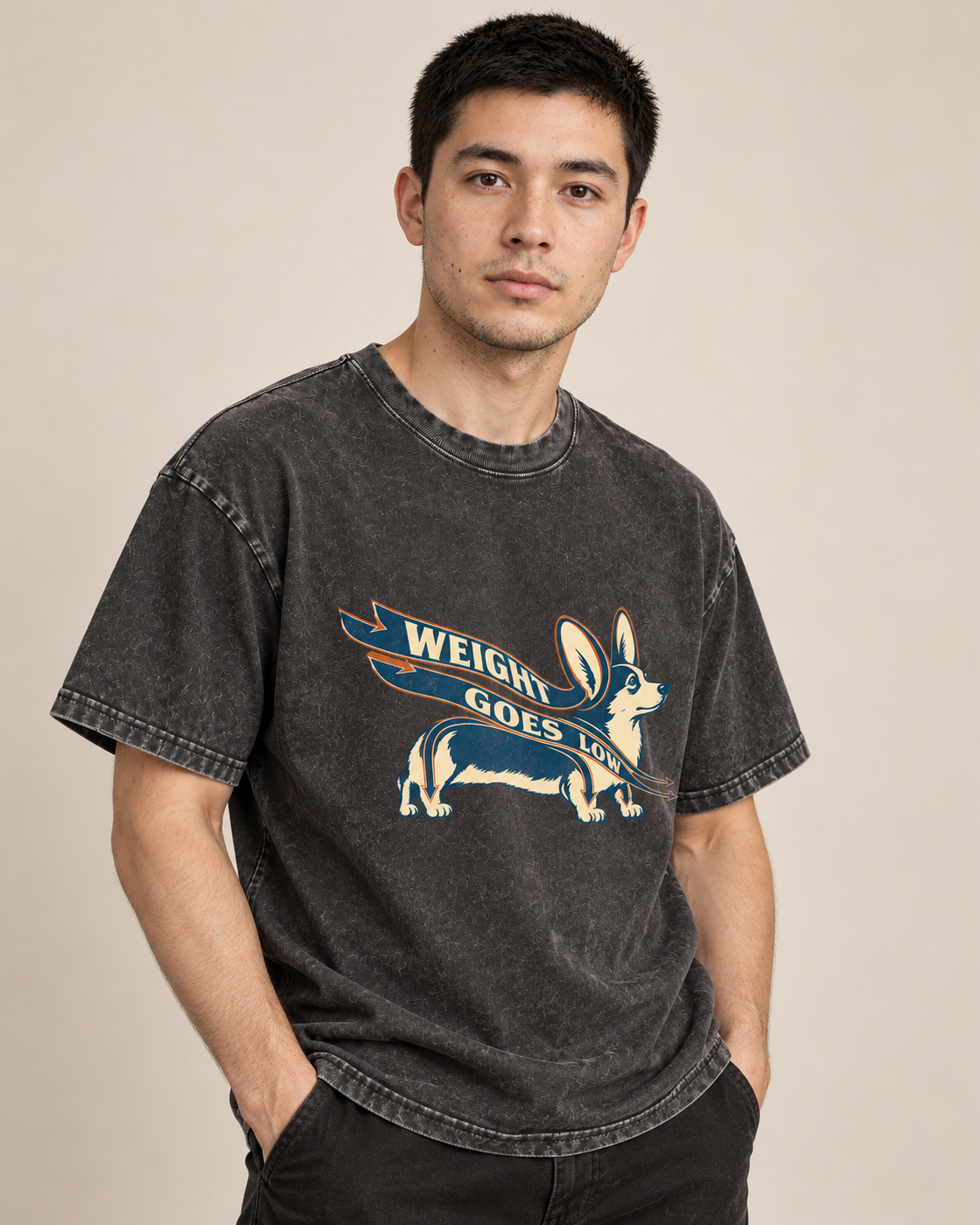 Adult model wears Black Corgi Weight Goes Low Ribbon Arrow washed T-shirt in a side-angle editorial portrait