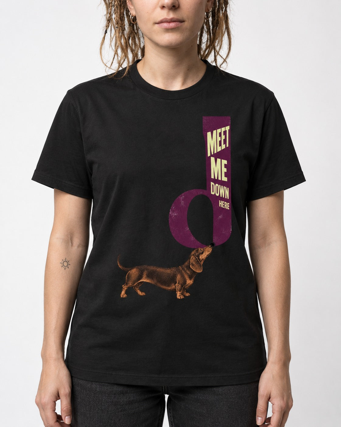 Dachshund Meet Me Down Here Letterform Loop Graphic T-Shirt in Black, worn by a model, front view