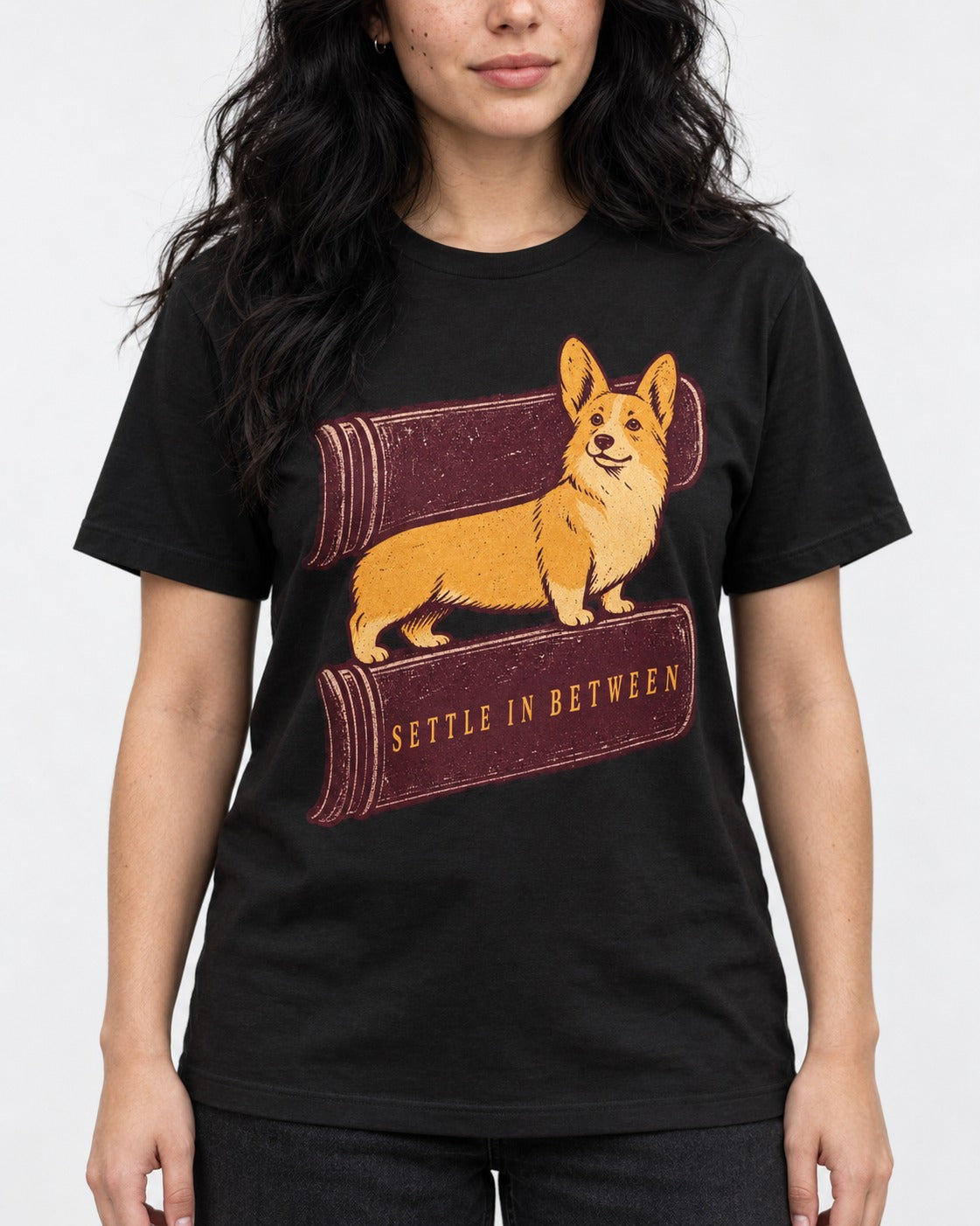 Corgi Settle in Between T-Shirt in Black, worn by a model, front view