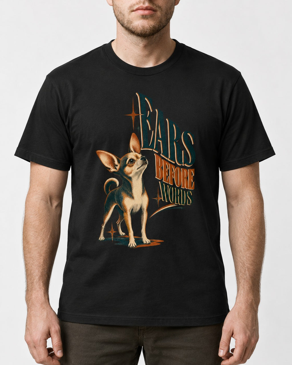 Chihuahua Ears Before Words Retro Typography T-Shirt in Black, worn by a model, front view