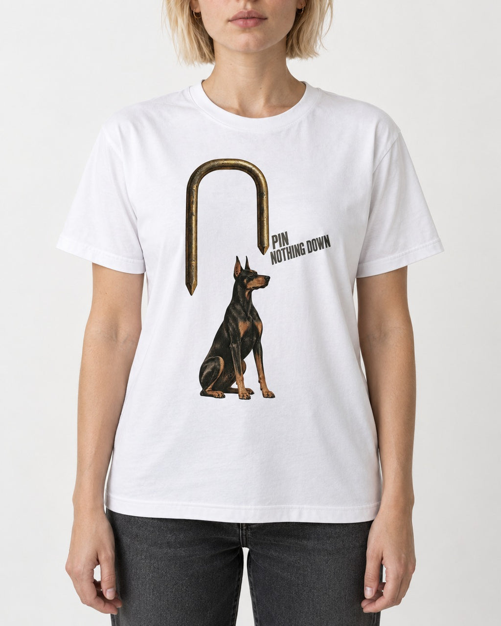 Nothing Pins Doberman Down T-Shirt in White, worn by a model, front view