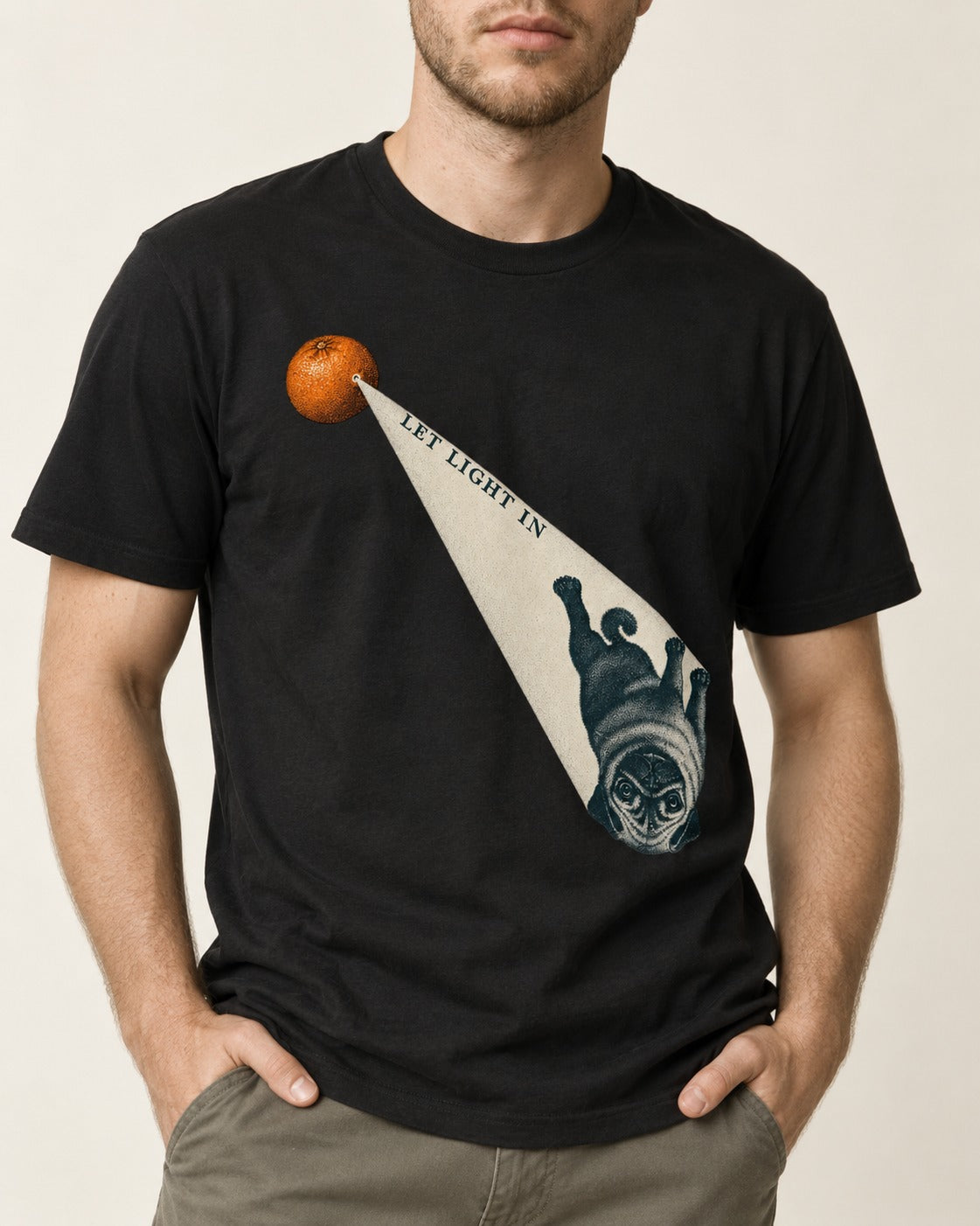 Pug Let Light In Camera Obscura Graphic T-Shirt in Black, worn by a model, front view
