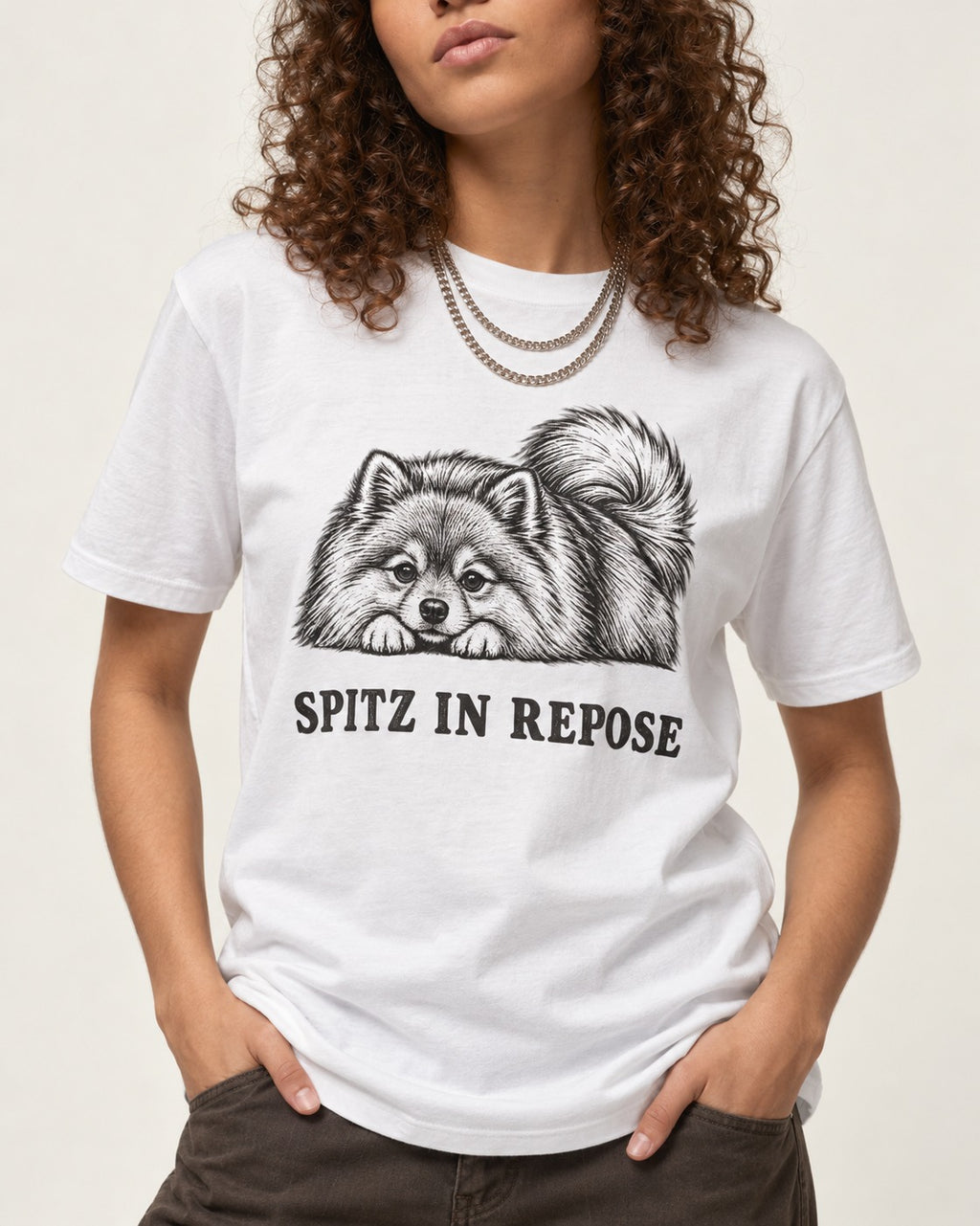 Pomeranian In Repose T-Shirt in White, worn by a model, front view