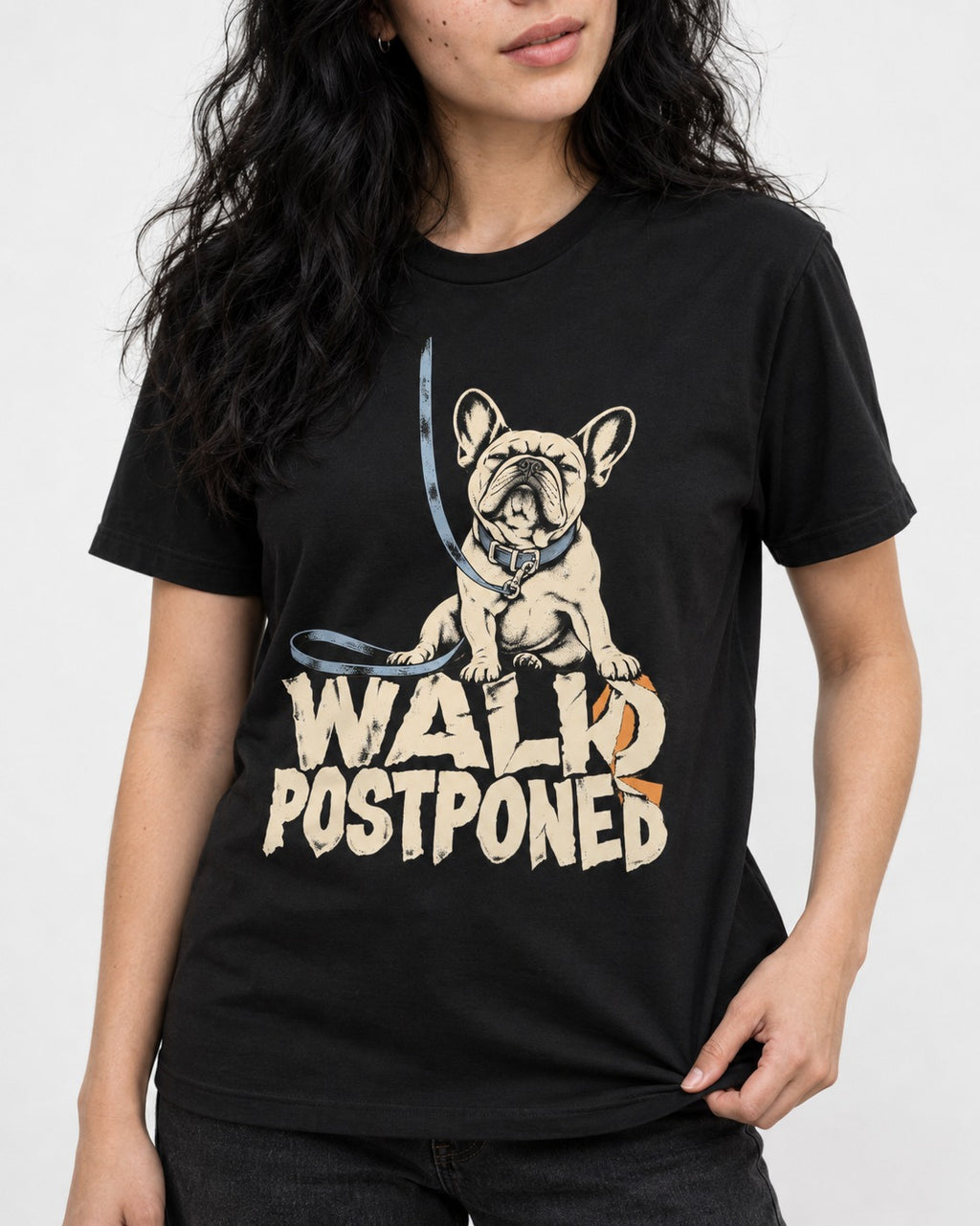 Frenchie Walk Postponed Leash Graphic T-Shirt in Black, worn by a model, front view