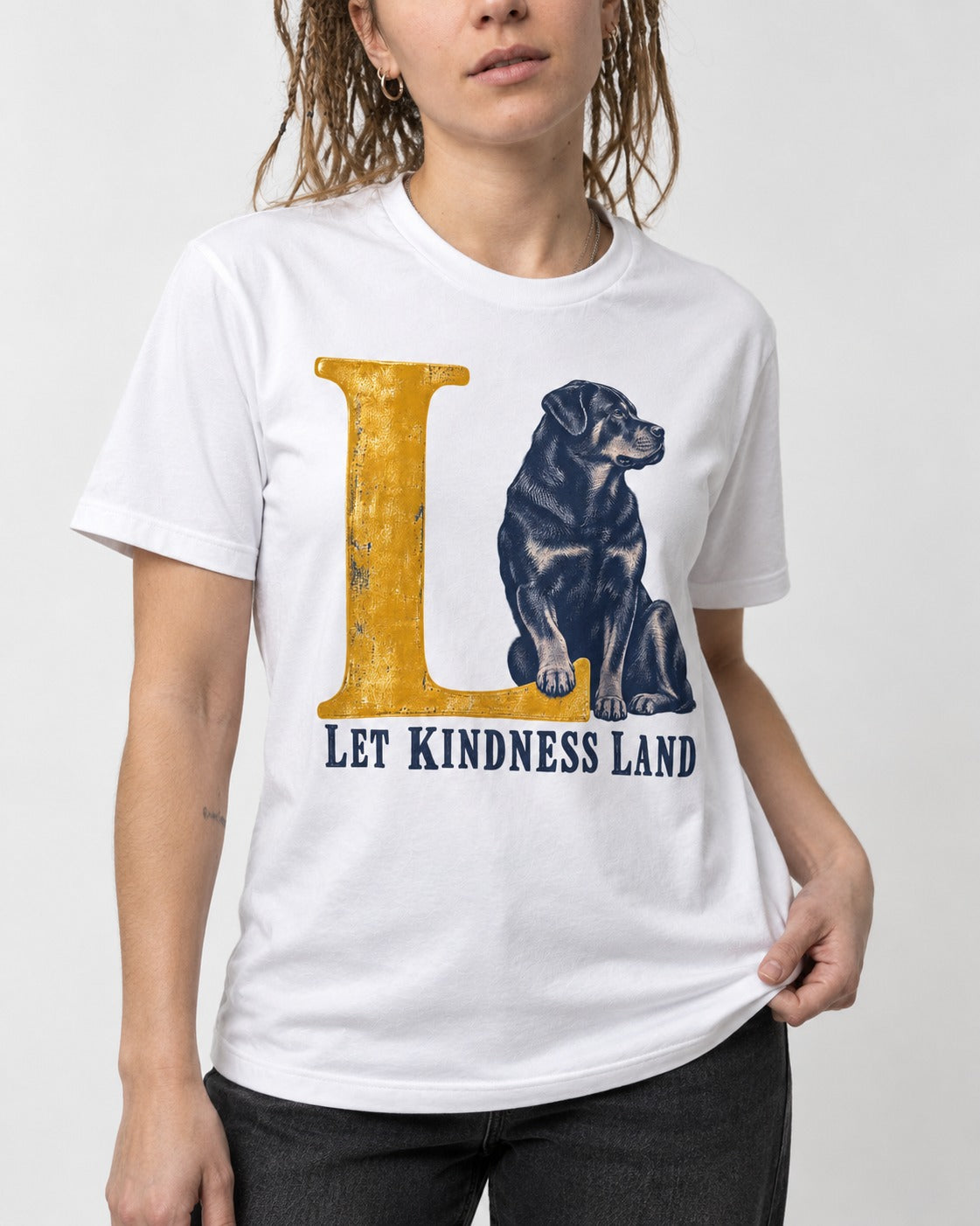 Let Kindness Lead Rottweiler T-Shirt in White, worn by a model, front view