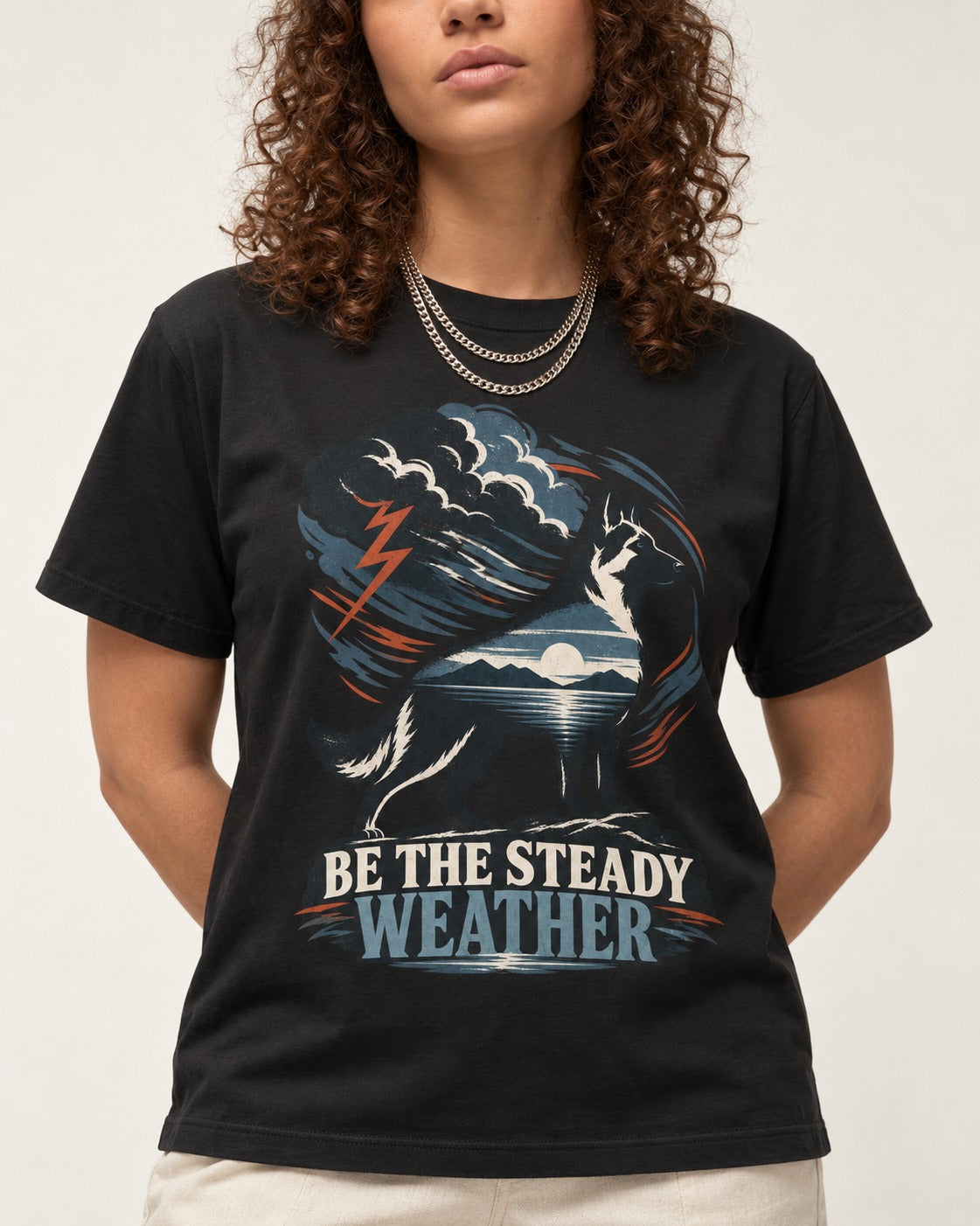 Be the Steady Weather Storm German Shepherd Dog Graphic T-Shirt in Black, worn by a model, front view