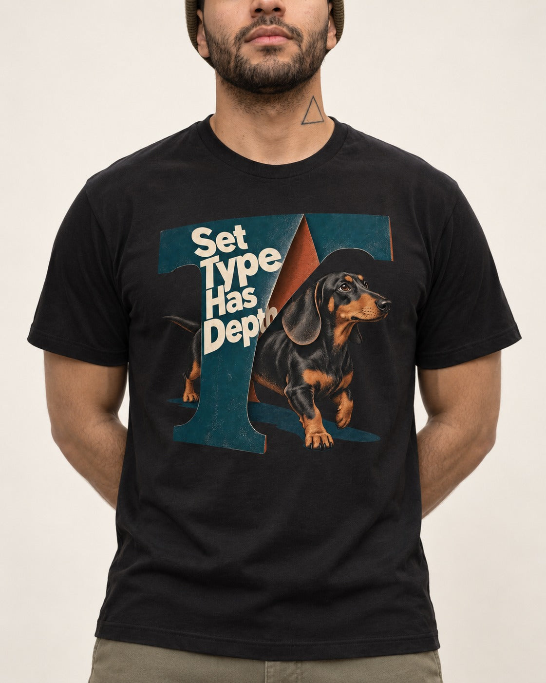 Dachshund Set Type Has Depth Folded Letter Graphic T-Shirt in Black, worn by a model, front view