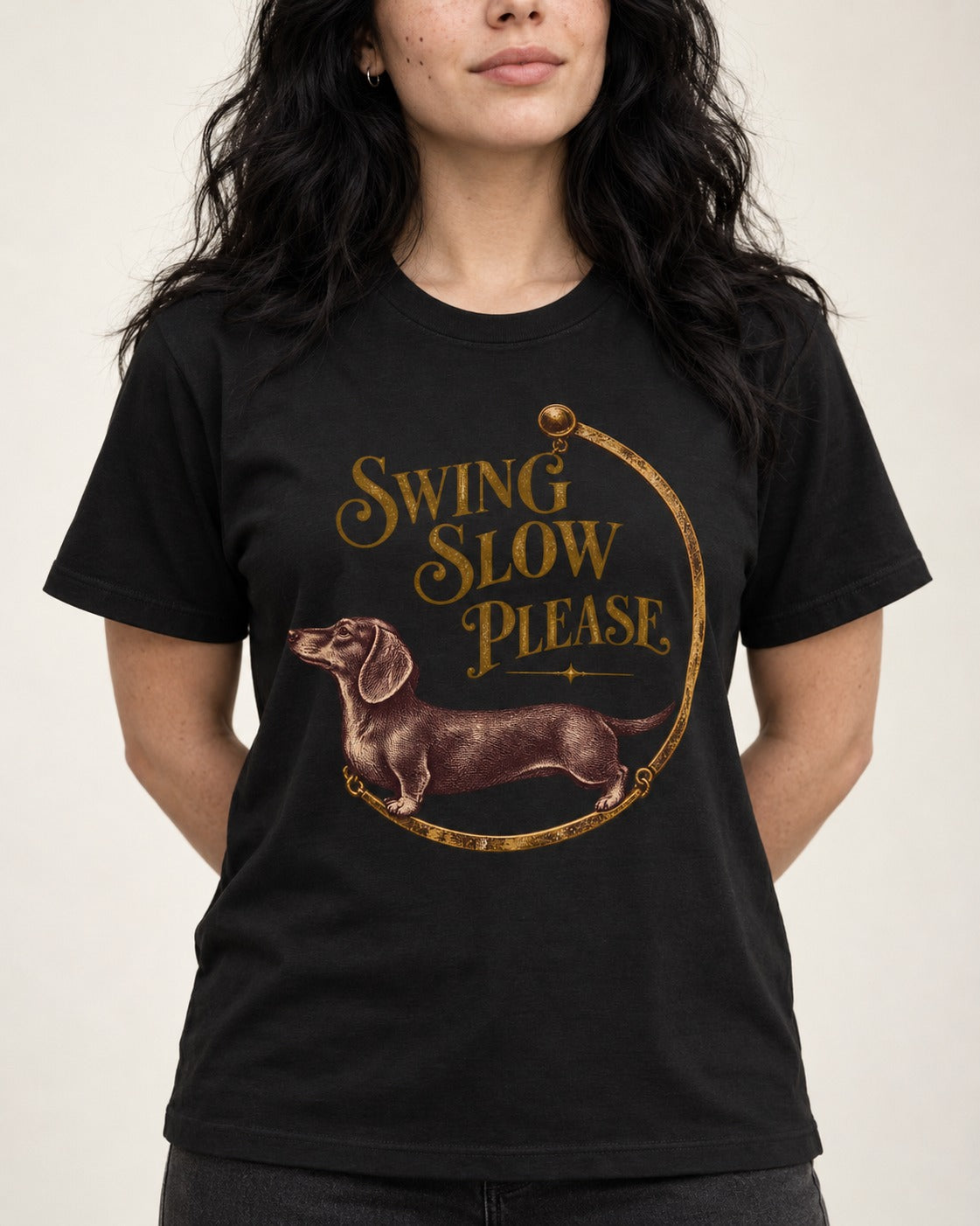 Dachshund Swing Slow Please Necklace Frame Graphic T-Shirt in Black, worn by a model, front view