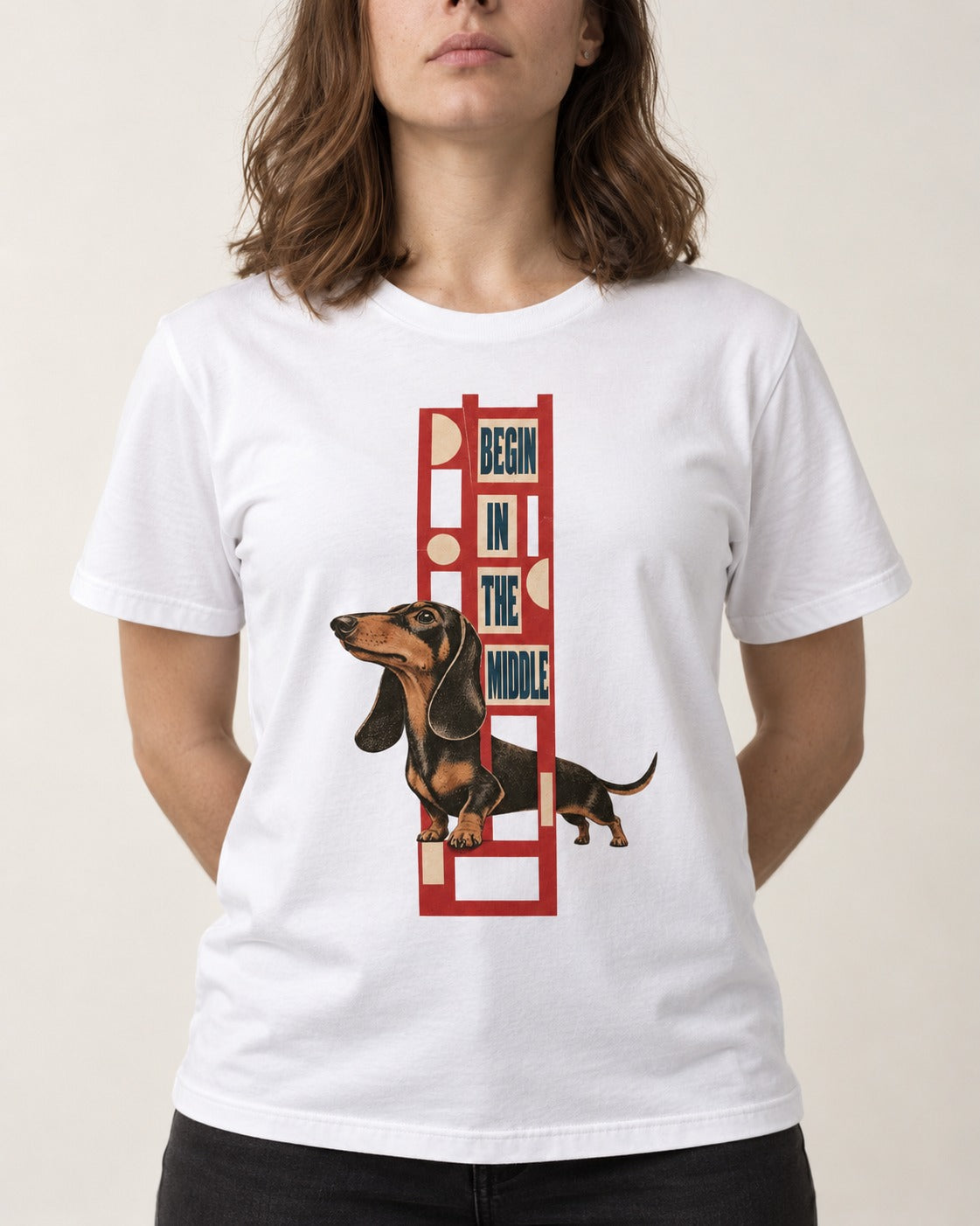 Dachshund Begins in the Middle T-Shirt in White, worn by a model, front view