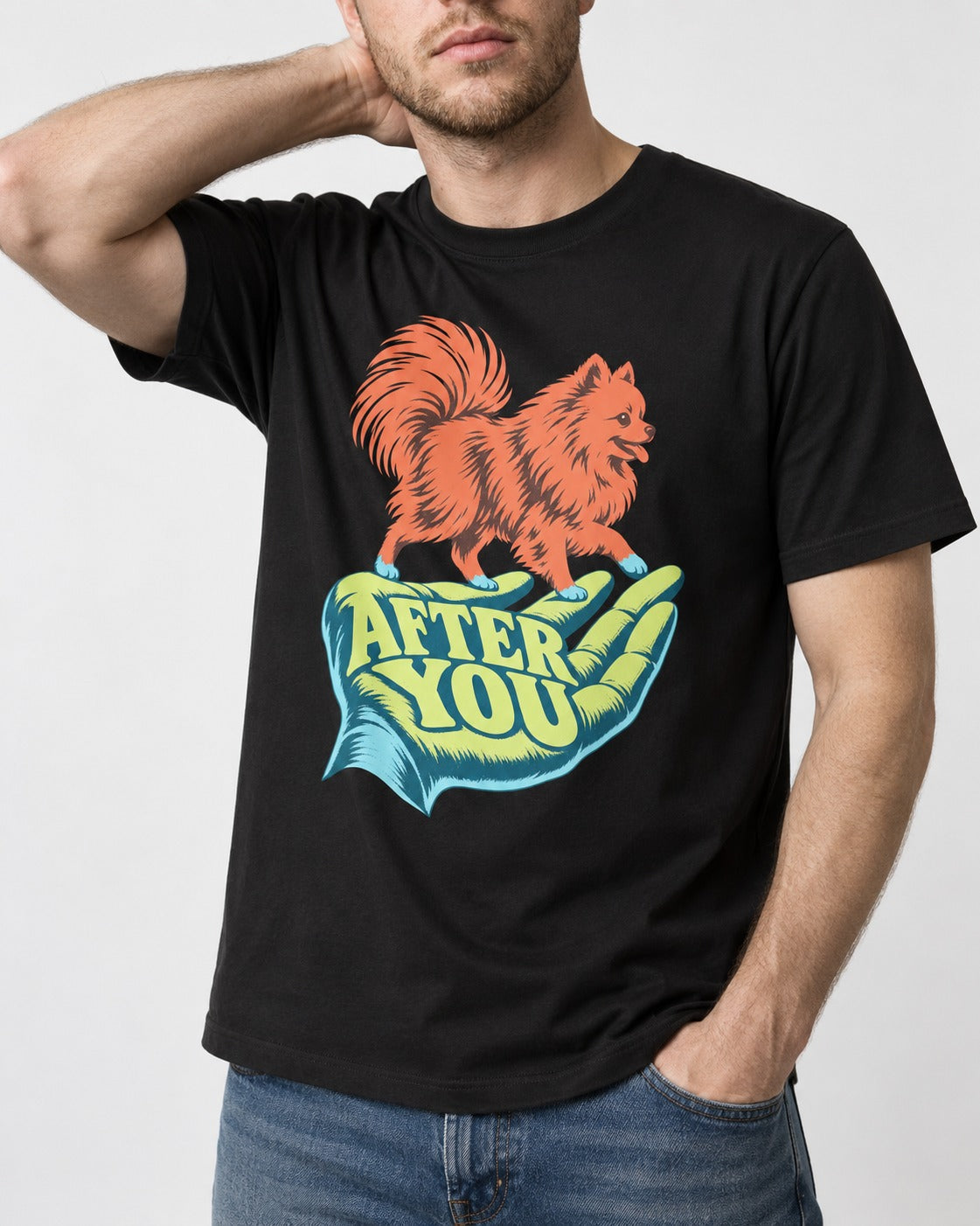 Pomeranian After You Helping Hand Graphic T-Shirt in Black, worn by a model, front view