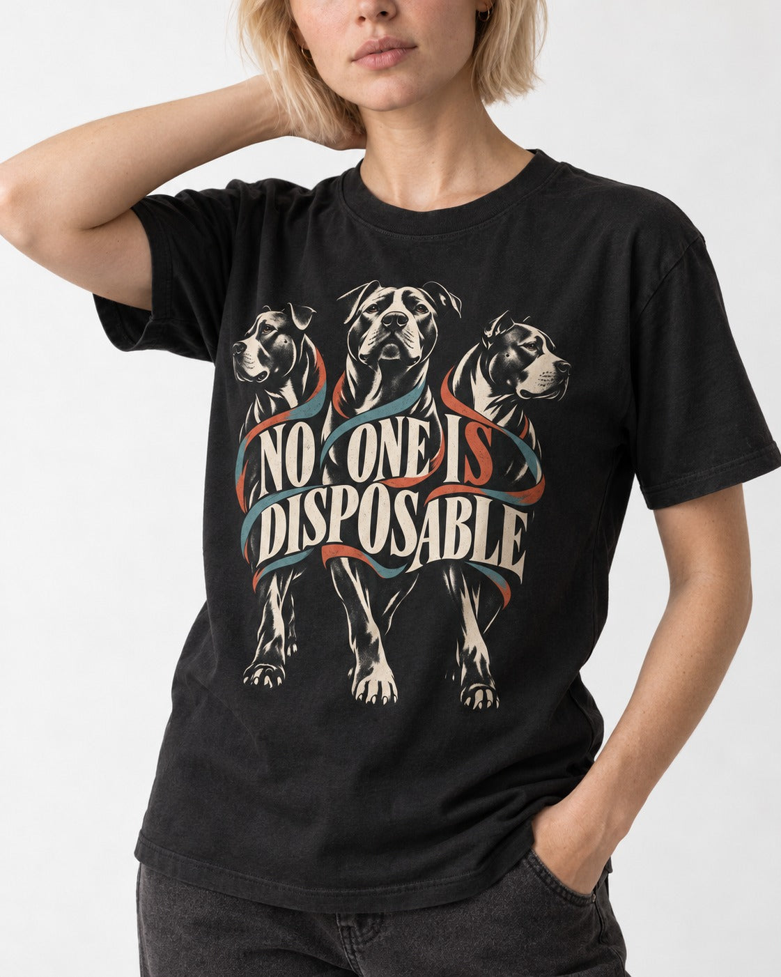 Pitbull No One Is Disposable Three Dogs Graphic T-Shirt in Black, worn by a model, front view