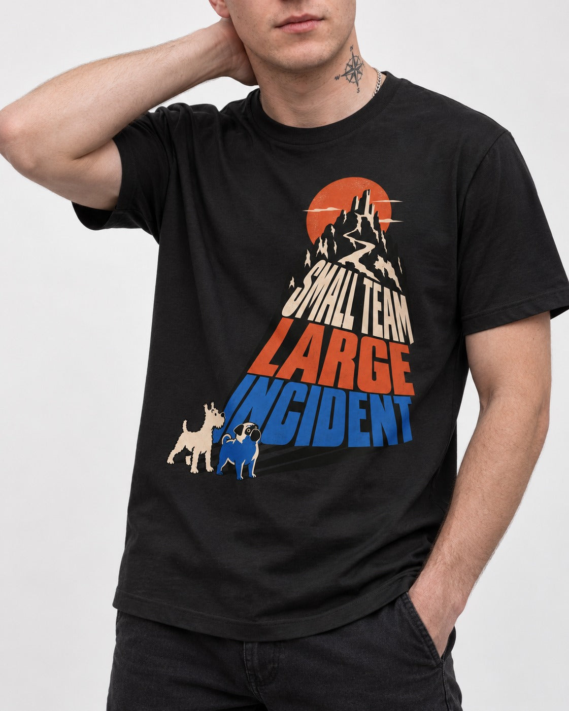 Pug Small Team Large Incident Mountain Graphic T-Shirt in Black, worn by a model, front view