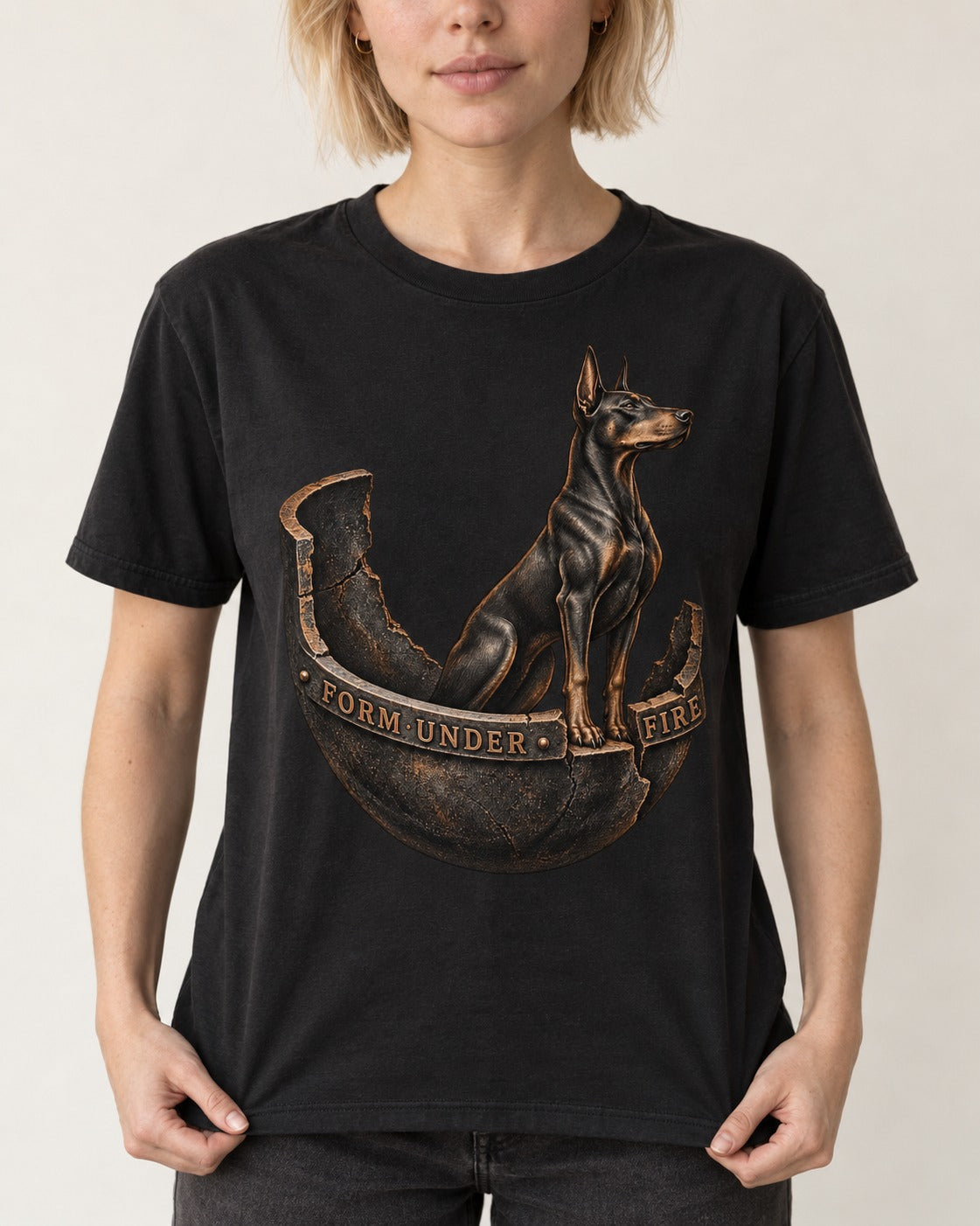 Doberman Form Under Fire Broken Shell Graphic T-Shirt in Black, worn by a model, front view