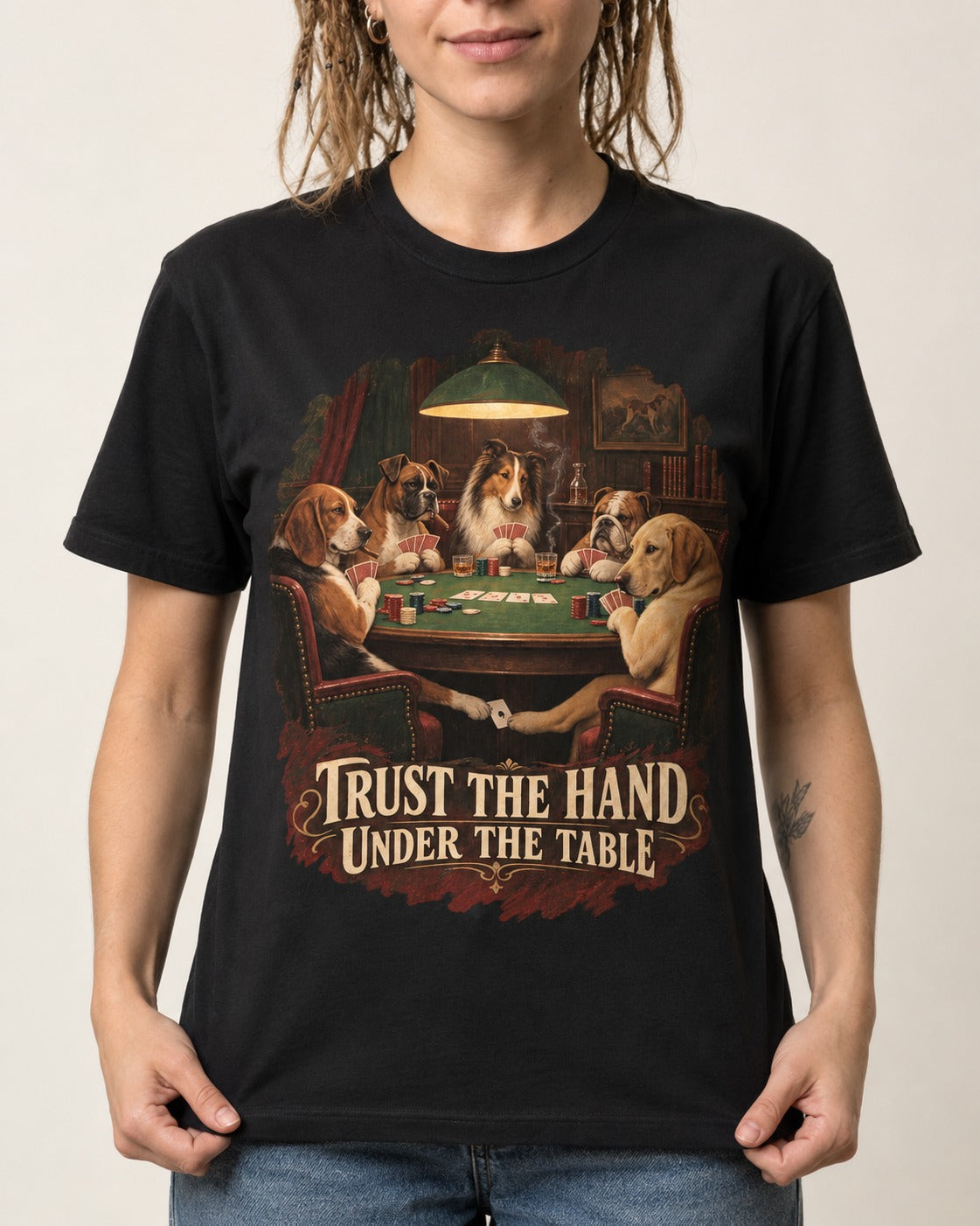 Labrador Retriever Trust the Hand Under the Table Poker Dogs Graphic T-Shirt in Black, worn by a model, front view