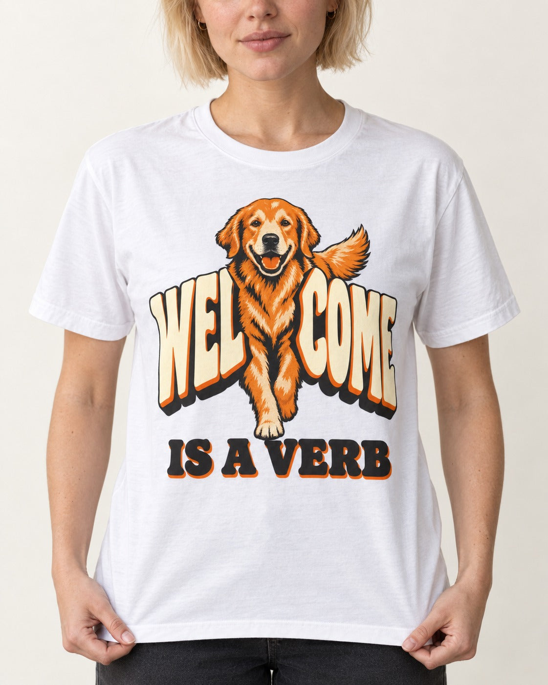 Golden Retriever Welcome Is a Verb T-Shirt in White, worn by a model, front view