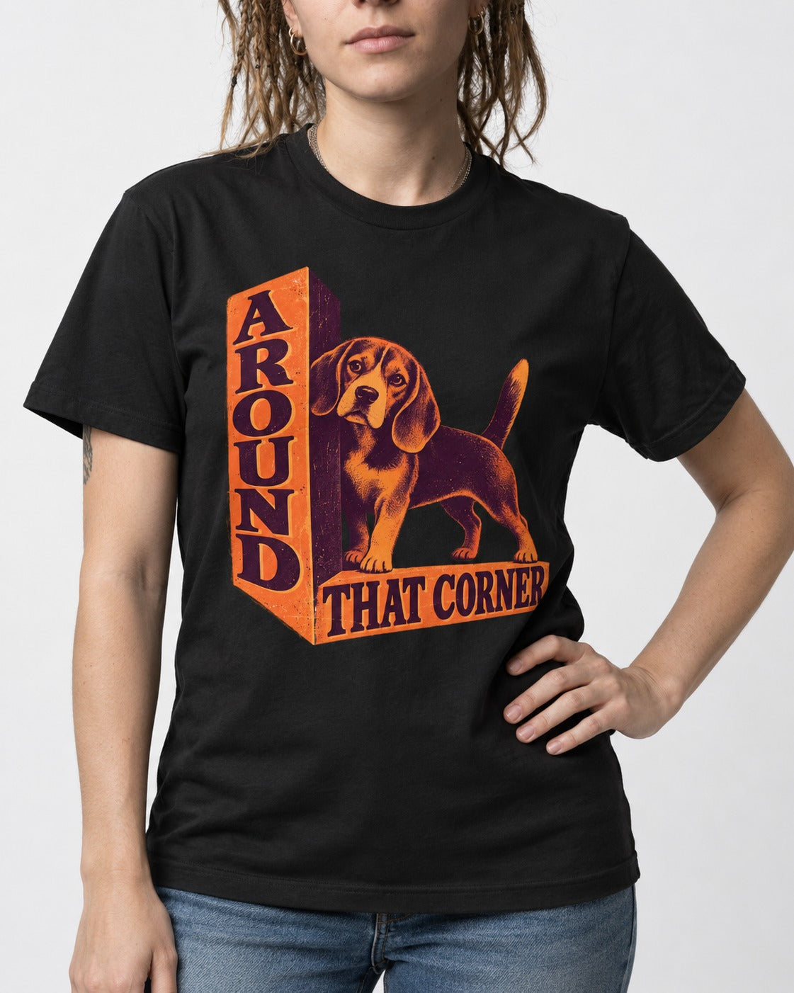 Beagle Around That Corner Graphic T-Shirt in Black, worn by a model, front view