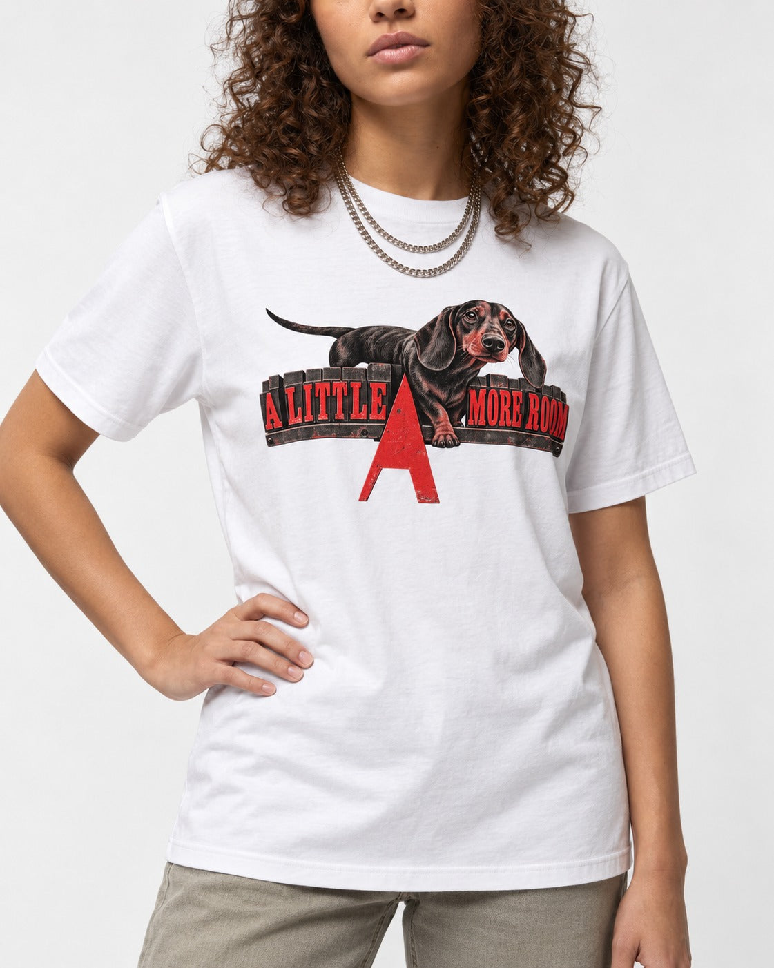 More Room for Dachshund T-Shirt in White, worn by a model, front view