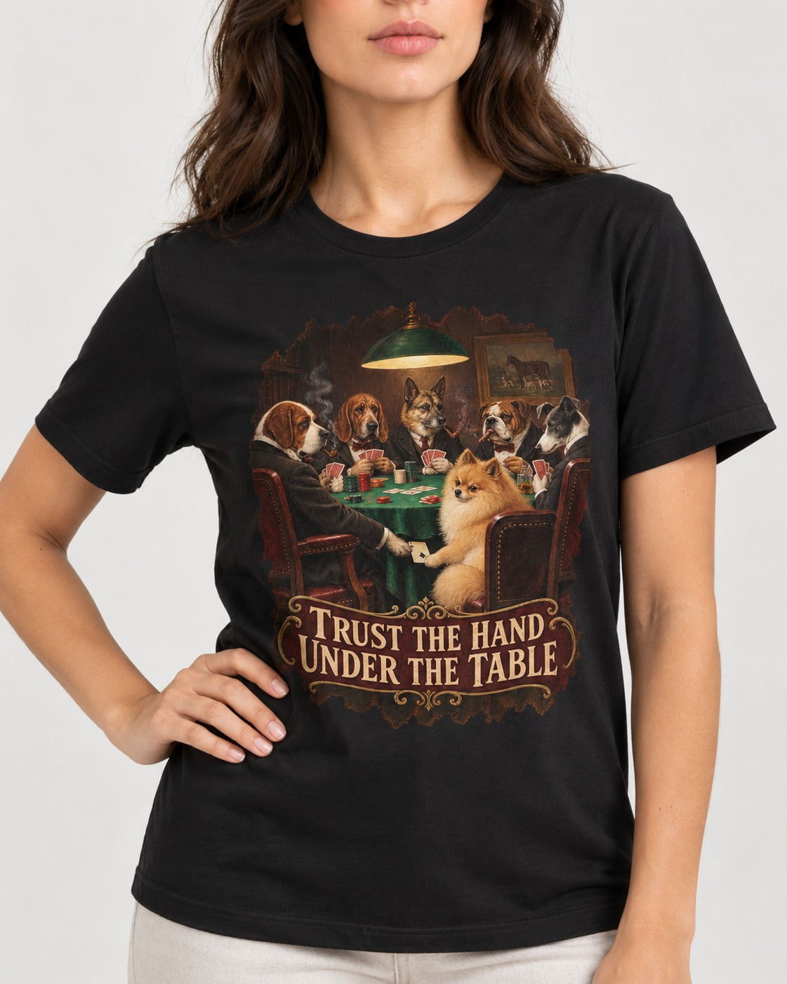 Pomeranian Trust the Hand Under the Table Poker Dogs Graphic T-Shirt in Black, worn by a model, front view