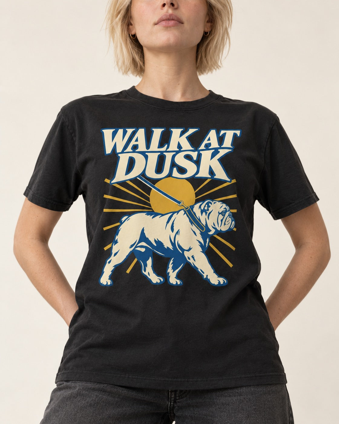 English Bulldog Walk at Dusk Sunset Graphic T-Shirt in Black, worn by a model, front view